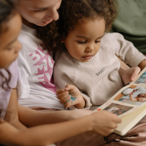 Family looking at photo album